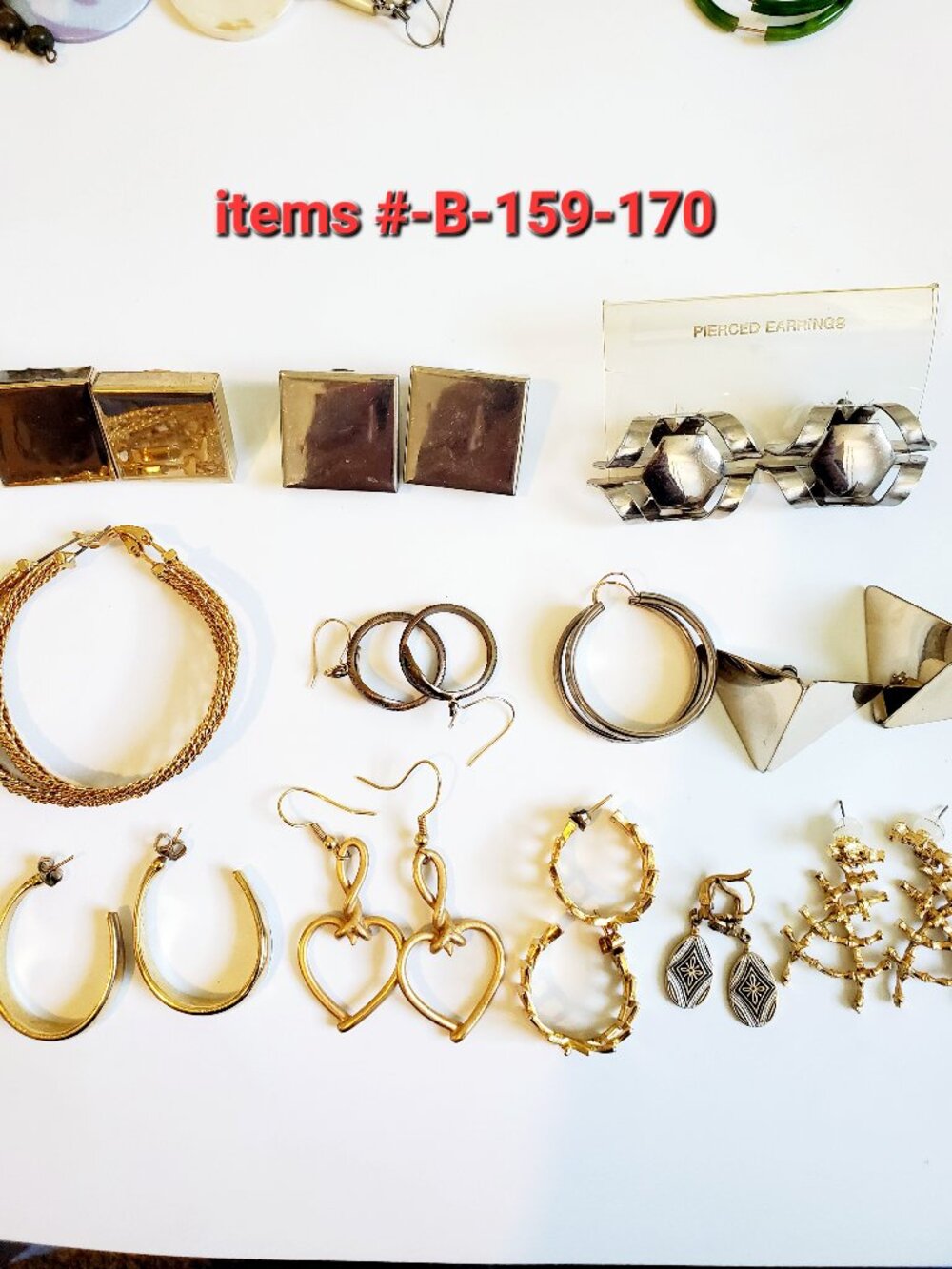 12 Pair of Pierced Earrings, items # B-159-170, . wt. 118 grams.